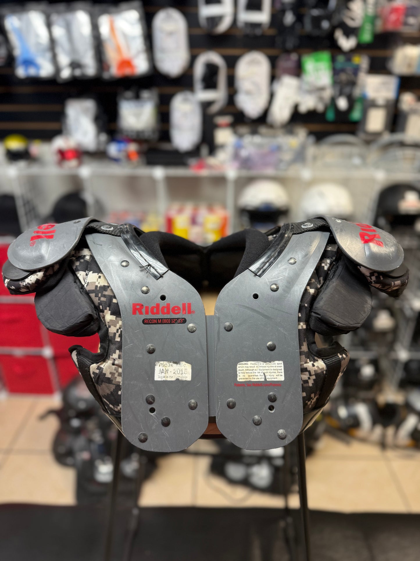 Used Riddell Youth Medium Shoulder Pads