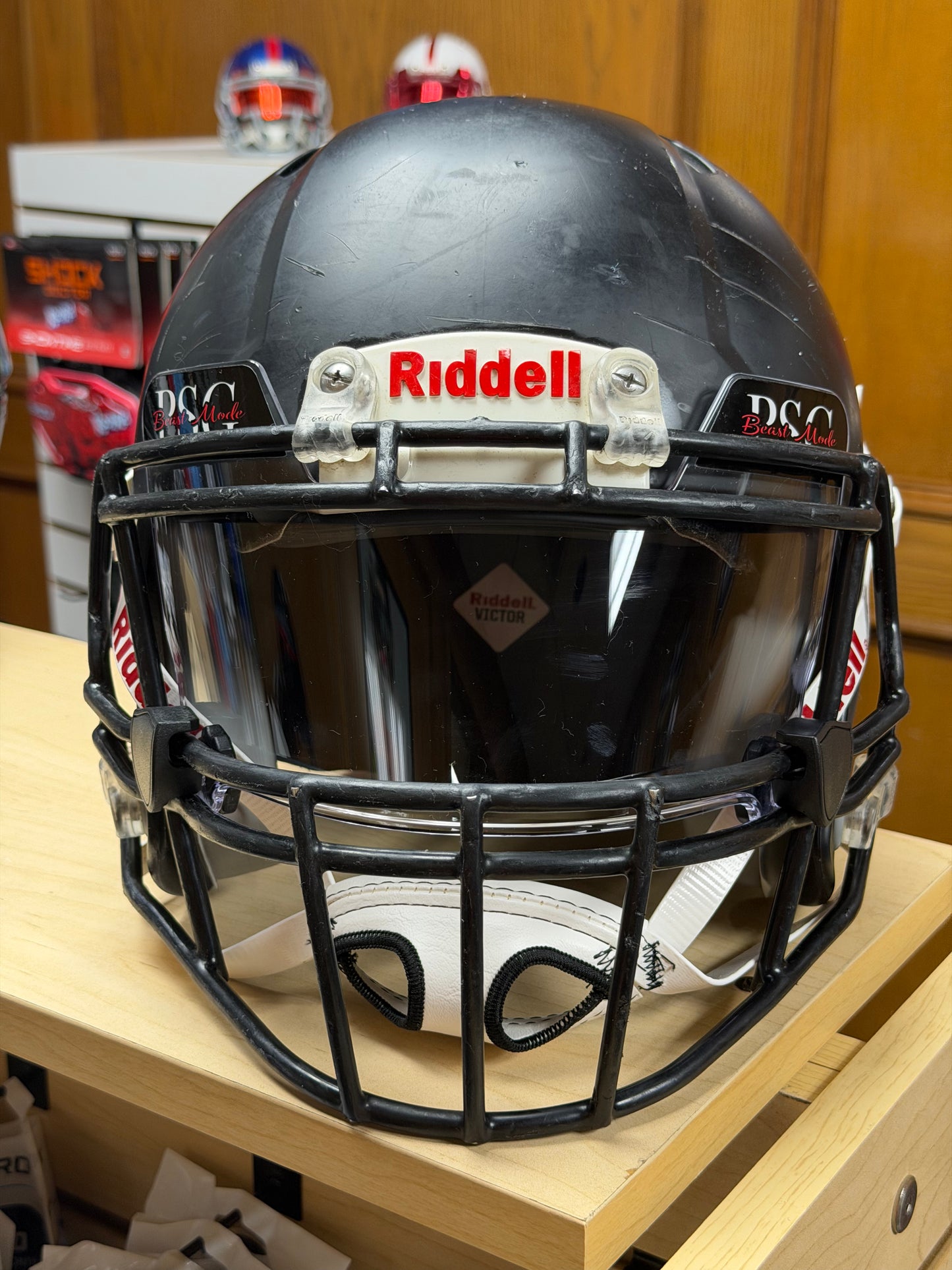 Used Riddell Victor Youth Medium Football Helmet with a Clear Visor