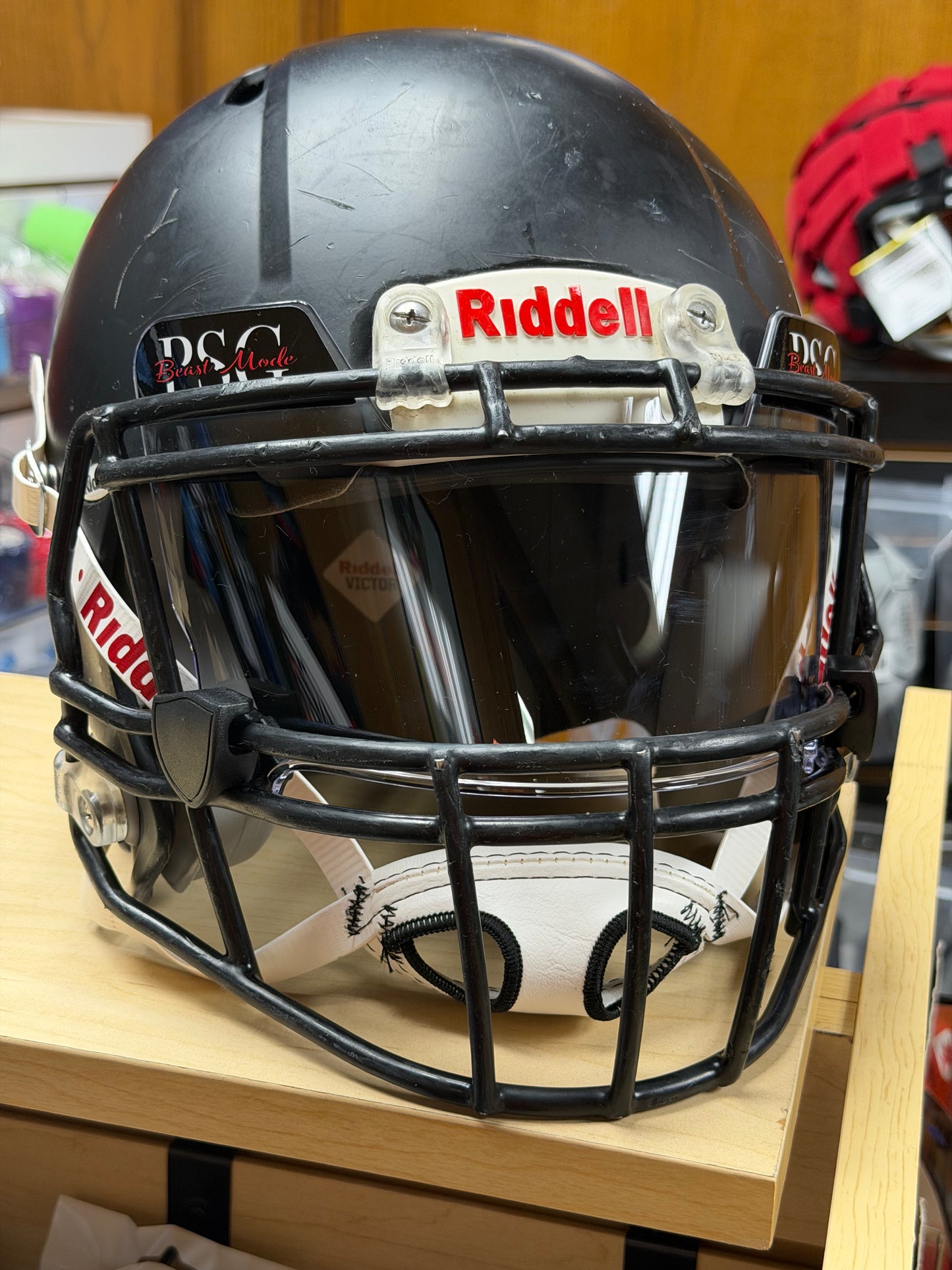 Used Riddell Victor Youth Medium Football Helmet with a Clear Visor