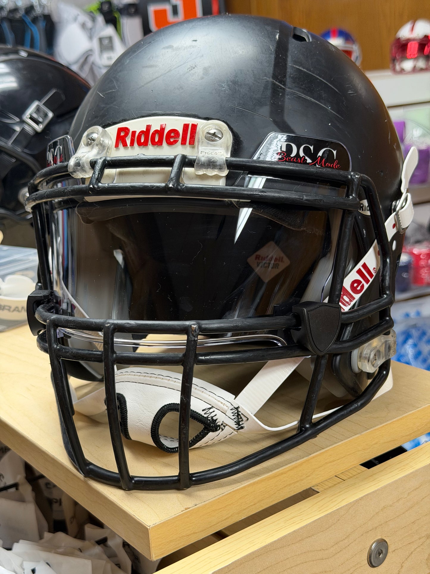 Used Riddell Victor Youth Medium Football Helmet with a Clear Visor