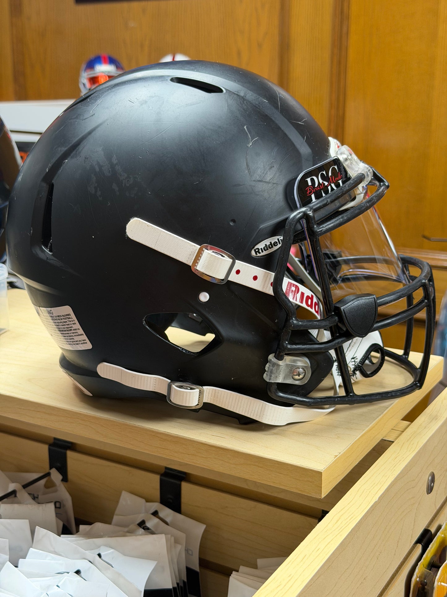 Used Riddell Victor Youth Medium Football Helmet with a Clear Visor