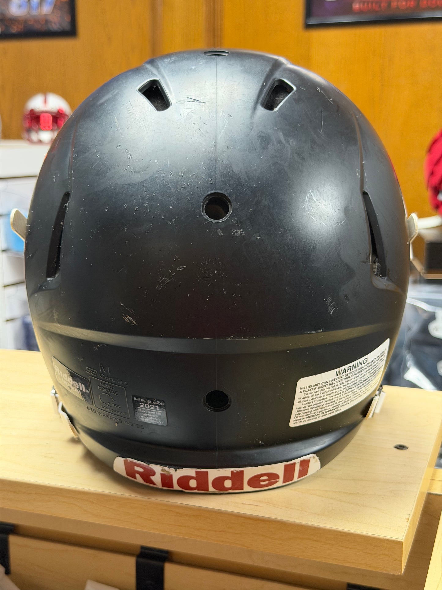Used Riddell Victor Youth Medium Football Helmet with a Clear Visor