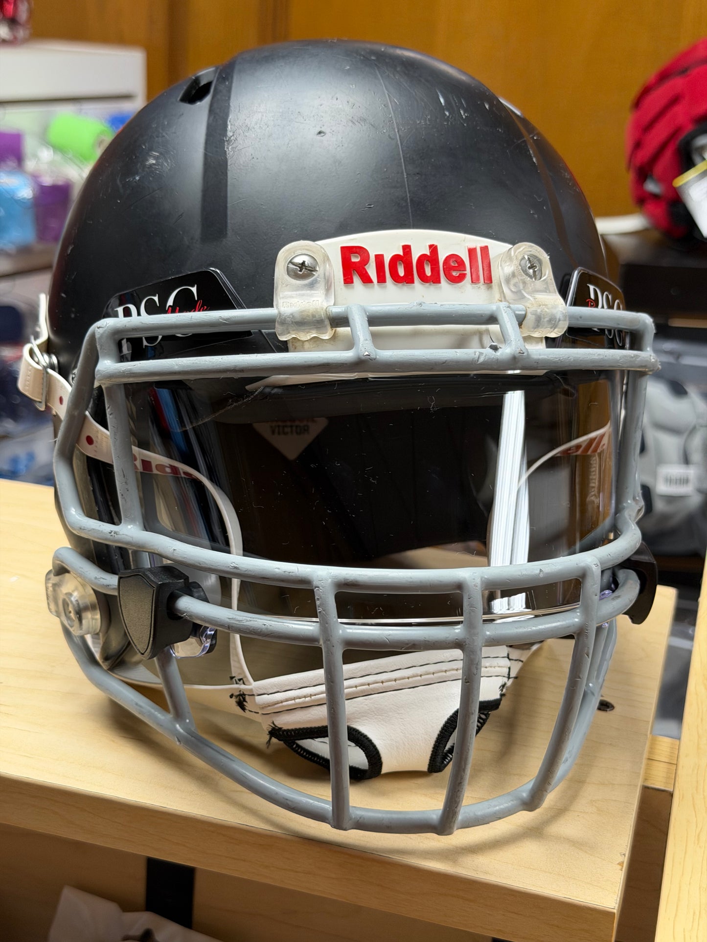 Used Riddell Victor Youth XS Football Helmet with a Clear Visor