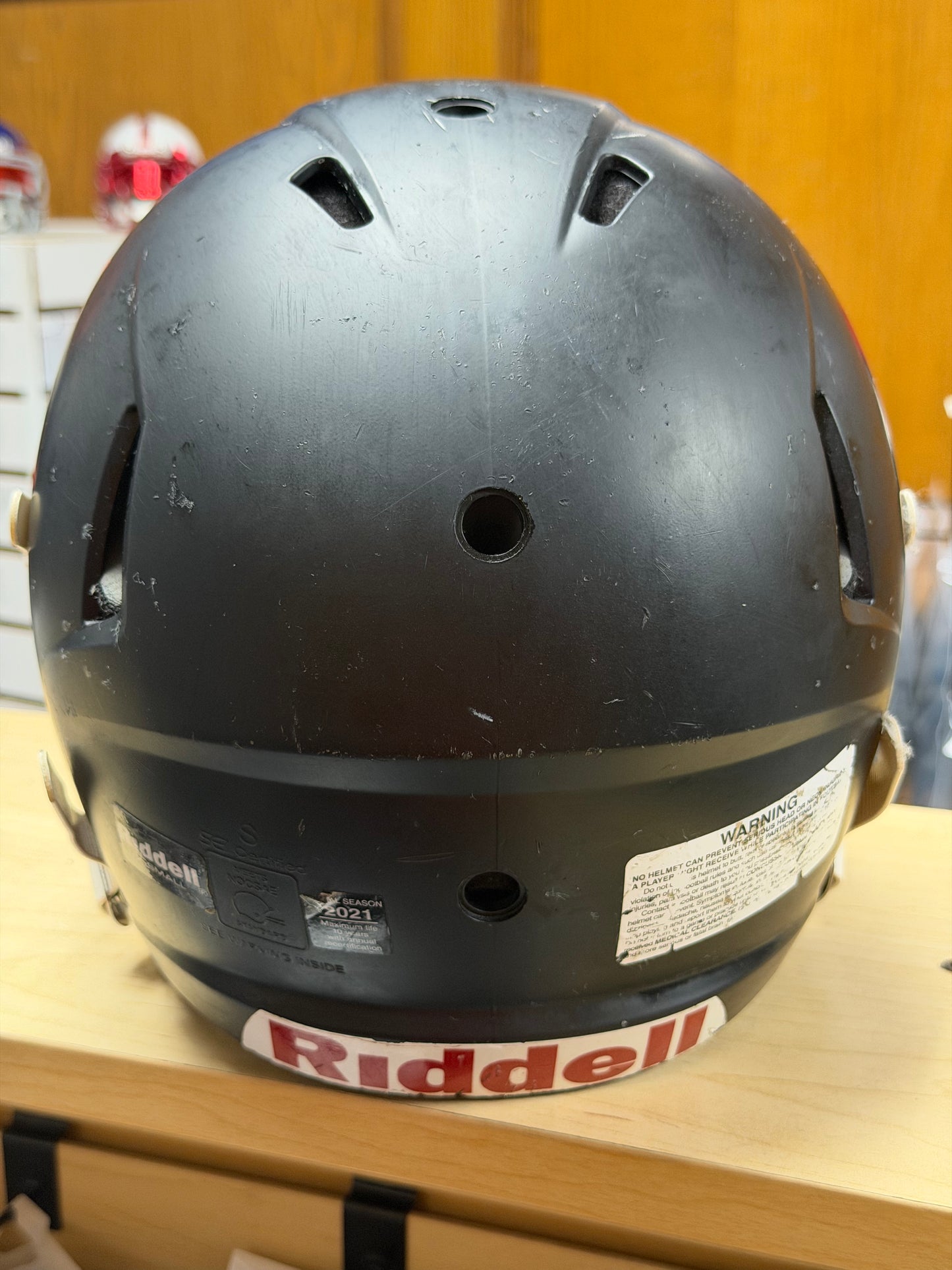 Used Riddell Victor Youth XS Football Helmet with a Clear Visor